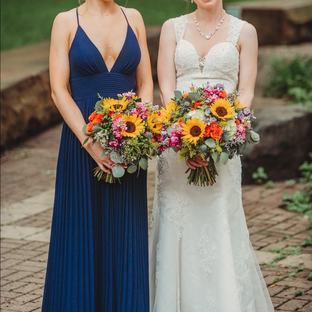 Blue floor length formal dress.